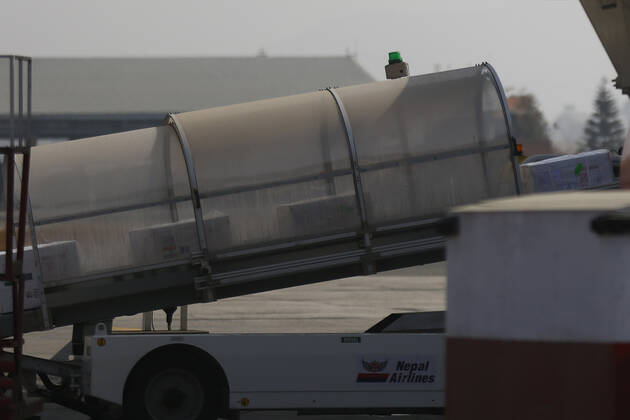 January 21, 2021, Kathmandu, Nepal: Airport staff unload Covid-19 AstraZeneca vaccines from Air India aircraft at Tribhuvan International Airport in Kathmandu, Nepal on Thursday, January 21, 2021. India under the Ã¢â‚¬ËœVaccine MaitriÃ¢â‚¬Â initiative is providing vaccines, in aid to Nepal with 1 million doses of vaccine against the coronavirus. Kathmandu Nepal - ZUMAg200 20210121_zap_g200_010 Copyright: xSkandaxGautamx