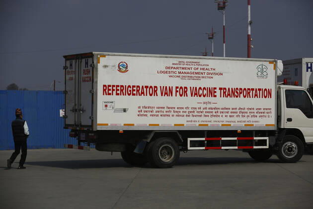 January 20, 2021, Kathmandu, Nepal: A refrigerator van is prepared to load Covid-19 AstraZeneca vaccines from Air India aircraft at Tribhuvan International Airport in Kathmandu, Nepal on Thursday, January 21, 2021. India under the Ã¢â‚¬ËœVaccine MaitriÃ¢â‚¬Â initiative is providing vaccines, in aid to Nepal with 1 million doses of vaccine against the coronavirus. Kathmandu Nepal - ZUMAg200 20210120_zap_g200_006 Copyright: xSkandaxGautamx