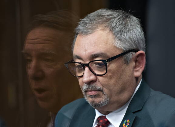 January 21, 2021, Quebec, PQ, Canada: Horacio Arruda, Quebec director of National Public Health looks down as Quebec Premier Francois Legault is reflected in plexiglass during a news conference on the COVID-19 pandemic, Thursday, January 21, 2021 at the legislature in Quebec City. Quebec Canada  - ZUMAc35_ 20210121_zaf_c35_040 Copyright: xJacquesxBoissinotx