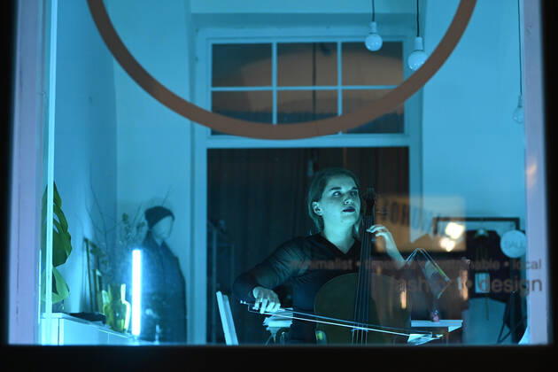 Actors, acrobats and musicians connected with the Cirk La Putyka ensemble performed as part of the Revived Shop windows event in the shop windows of selected closed companies in the center of Prague, Czech Republic, January 21, 2021. (CTKxPhoto OndrejxDeml) CTKPhotoP202101210987301  dml 007