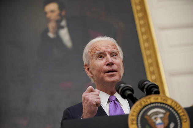 January 21, 2021, Washington, District of Columbia, USA: U.S. President Joe Biden speaks during an event on his administration s Covid-19 response in the State Dining Room of the White House in Washington, D.C., U.S., on Thursday, Jan. 21, 2021. Biden in his first full day in office plans to issue a sweeping set of executive orders to tackle the raging Covid-19 pandemic that will rapidly reverse or refashion many of his predecessor s most heavily criticized policies Washington USA - ZUMAs152 20210121_zaa_s152_124 Copyright: xAlxDragox-xPoolxViaxCnpx