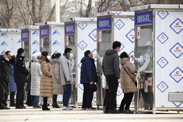 PCR tests in Beijing People wait in line to take PCR tests in Beijing s Xicheng district on Jan. 22, 2021, amid renewed concerns over the spread of the novel coronavirus. 