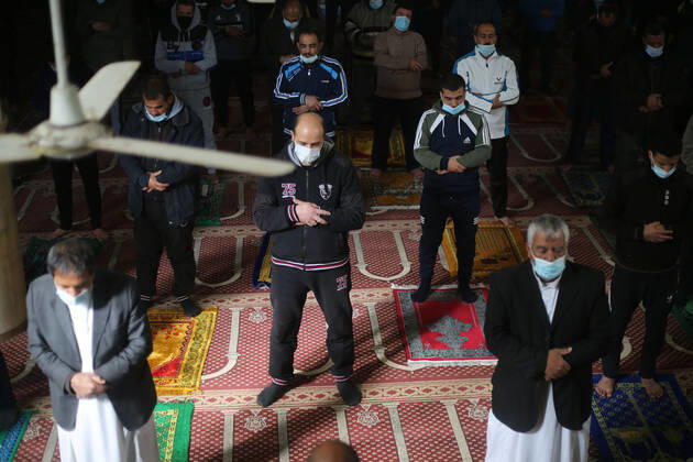 January 22, 2021, Deir Al-Balah, The Gaza Strip, Palestine: Palestinians attend Fraiday prayers in Deir al-Balah city as mosques reopen at the Gaza Strip. Deir Al-Balah Palestine - ZUMAq100 20210122_zaa_q100_061 Copyright: xMahmoudxKhattabx