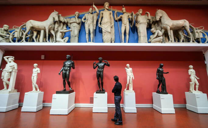 MOSCOW, RUSSIA - JANUARY 22, 2021: A visitor looks at Classical statues at at the Pushkin State Museum of Fine Arts. Starting from 22 January 2021, Moscow-based state museums of the federal level are reopening for in-person visits with 50% pre-COVID-19 capacity after being closed for two months, as Moscowâ€™s authorities ease coronavirus restrictions. Sergei Savostyanov TASS  TS0F4D46