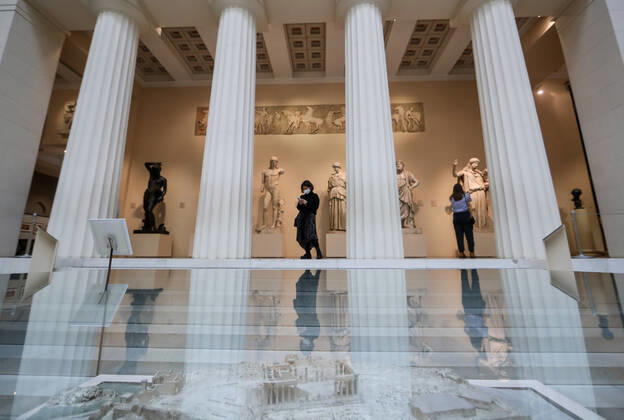 MOSCOW, RUSSIA - JANUARY 22, 2021: Visitors look at Classical statues at the Pushkin State Museum of Fine Arts. Starting from 22 January 2021, Moscow-based state museums of the federal level are reopening for in-person visits with 50% pre-COVID-19 capacity after being closed for two months, as Moscowâ€™s authorities ease coronavirus restrictions. Sergei Savostyanov TASS  TS0F4D45