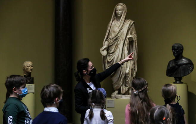 MOSCOW, RUSSIA - JANUARY 22, 2021: A tour guide and young visitors look at Classical statues at the Pushkin State Museum of Fine Arts. Starting from 22 January 2021, Moscow-based state museums of the federal level are reopening for in-person visits with 50% pre-COVID-19 capacity after being closed for two months, as Moscowâ€™s authorities ease coronavirus restrictions. Sergei Savostyanov TASS  TS0F4D43