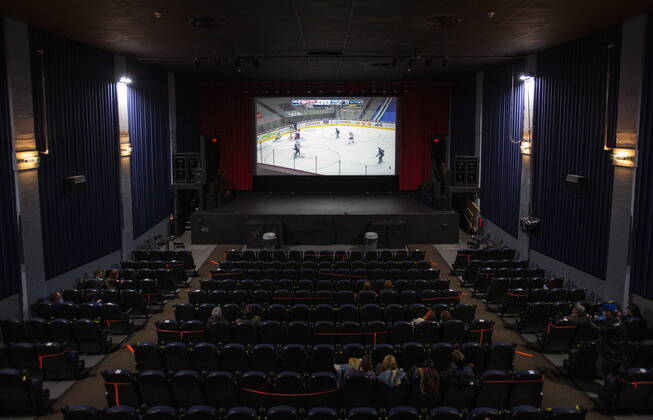 January 23, 2021, Vancouver, BC, Canada: The Vancouver Canucks and Montreal Canadiens NHL game is shown on the Rio Theatre s screen on the theatre s first day open as a sports bar in Vancouver, Saturday, Jan. 23, 2021. Vancouver Canada  - ZUMAc35_ 20210123_zaf_c35_052 Copyright: xMarissaxTielx