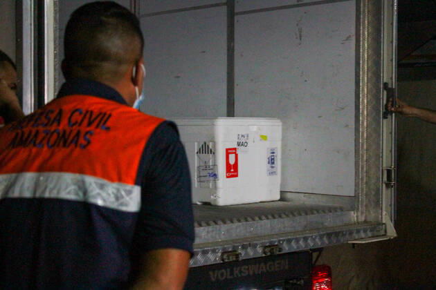 MANAUS, AM - 24.01.2021: CHEGADA DAS VACINAS ASTRAZENECA EM MANAUS - Arrival of the 132,500 doses of the AstraZeneca Oxford vaccine, this Saturday night (23), in Manaus (AM), at Eduardo Gomes International Airport. The boxes with the vaccines were taken to the headquarters of the Health Surveillance Foundation (FVS-AM). x2023651x  SandroxPereira