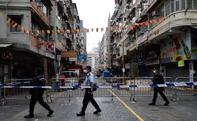Coronavirus in China, Lockdown in Hongkong January 24, 2021, Hong Kong, CHINA: Police patrols walking through barricaded Temple Street in the restricted zone on the second day of lockdown.Jan-24,2021Hong Kong.ZUMA Hong Kong CHINA - ZUMAl137 20210124_zap_l137_009 Copyright: xLiauxChung-renx