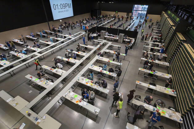 January 24, 2021, Seattle, Washington, U.S: Overview of the pop up COVID-19 vaccine clinic at the Amazon Headquarters in Seattle on Sunday, January 24, 2021. Amazon partnered with Virginia Mason Franciscan Health to vaccinate 2,000 Washingtonians who currently qualify to be vaccinated under the stateÃ¢â‚¬â ¢s COVID-19 Vaccine Phases guidelines. Seattle U.S. - ZUMAg235 20210124_zap_g235_007 Copyright: xPaulxChristianxGordonx