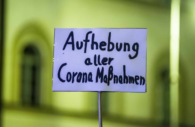 January 24, 2021, Munich, Bavaria, Germany: Remove all Corona measures . On the heels of a court win with the Verwaltungsgerichtshof, Markus Haintz of the Querdenken group organized an anti-mask, anti-anti-Corona measure demonstration in front of the Verwaltungsgerichtshof in Munich, Germany. Approximately 250 were in attendance and displayed a jump in radicalization and propensity for violence against media representatives not seen prior to the end of the Trump era. At one point, media representatives were swarmed, physically attacked and prevented from working as they were removed from the designated press area- with the help of their own conspiracy media representatives. The demonstration also had members of Pegida, such as Munich - ZUMAb160 20210124_zbp_b160_002 Copyright: xSachellexBabbarx