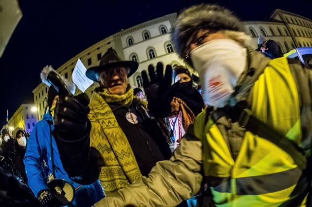January 24, 2021, Munich, Bavaria, Germany: An example of the swarming behavior led by Karl Hilz against journalists that turned violence at a point as they removed accredited journalists from their press area in an unhinged and violent manner. On the heels of a court win with the Verwaltungsgerichtshof, Markus Haintz of the Querdenken group organized an anti-mask, anti-anti-Corona measure demonstration in front of the Verwaltungsgerichtshof in Munich, Germany. Approximately 250 were in attendance and displayed a jump in radicalization and propensity for violence against media representatives not seen prior to the end of the Trump era. At one point, media representatives were swarmed, physically attacked and prevented from working as the - ZUMAb160 20210124_zbp_b160_040 Copyright: xSachellexBabbarx