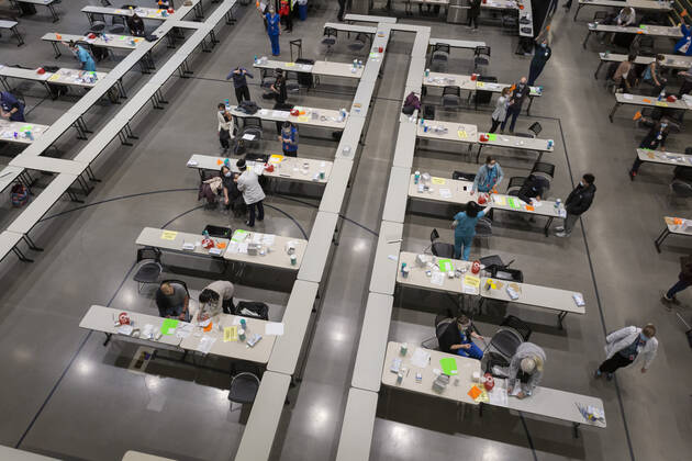 January 24, 2021, Seattle, Washington, USA: Overview of the pop up COVID-19 vaccine clinic at the Amazon Headquarters in Seattle on Sunday, January 24, 2021. Amazon partnered with Virginia Mason Franciscan Health to vaccinate 2,000 Washingtonians who currently qualify to be vaccinated under the stateÃ¢â‚¬â ¢s COVID-19 Vaccine Phases guidelines. Seattle USA - ZUMAg235 20210124_zap_g235_018 Copyright: xPaulxChristianxGordonx