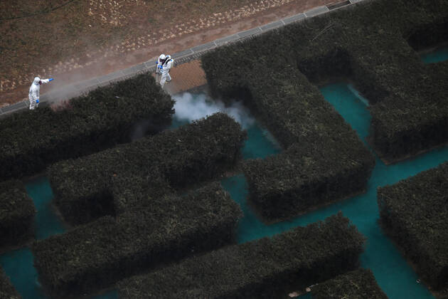 (210125) -- BEIJING, Jan. 25, 2021 -- Epidemic prevention staff conduct disinfection at the Ronghui residential compound in Daxing s Tiangongyuan subdistrict, Beijing, capital of China, Jan. 25, 2021. The COVID-19 risk classification of the Ronghui residential compound, where several locally transmitted COVID-19 cases had been detected recently, was upgraded to high-risk on Jan. 20. ) CHINA-BEIJING-COVID-19-DISINFECTION (CN) SunxRuibo 