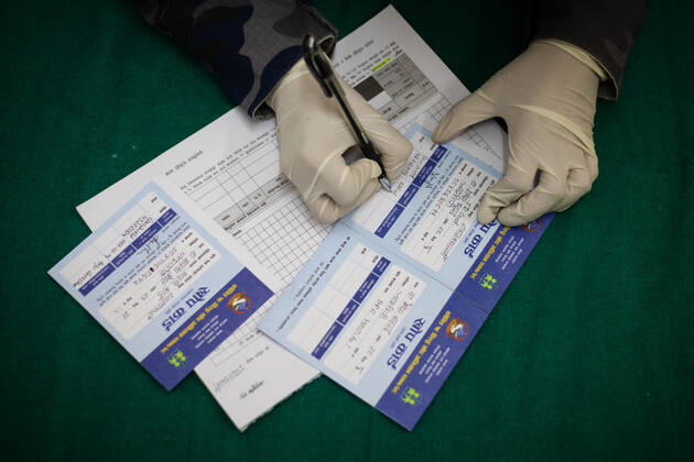 Coronavirus in Nepal, Impfungen in Kathmandu February 4, 2021, Kathmandu, 3, Nepal: A health worker collects data of health workers as she prepares to administer COVID-19 vaccine to frontlines health workers at Nepal s Armed Police Force..Nepal government is launching the Oxford-AstraZeneca vaccination campaign against coronavirus (Covid19) starting today..Nepalese Health and sanitation workers deployed in the frontlines will be the first to receive the vaccines in the first phase of the campaign. Over 400,000 such frontline workers will be included in the initial stage. Kathmandu Nepal - ZUMAs197 20210204_zaa_s197_002 Copyright: xPrabinxRanabhatx