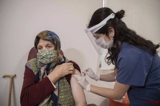 (210127) -- ISTANBUL, Jan. 27, 2021 -- A woman receives a dose of COVID-19 vaccine in Istanbul, Turkey, Jan. 27, 2021. A state hospital in Turkey s largest city Istanbul Wednesday was filled with senior citizens who came to be vaccinated against COVID-19 as part of the ongoing mass inoculation program in the country. TO GO WITH Feature: Turkish seniors hope pandemic to end with COVID-19 vaccines (Photo by Xinhua) TURKEY-ISTANBUL-VACCINATION OsmanxOrsal 