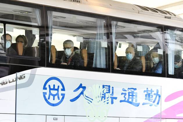 WHO probe into coronavirus origins in Wuhan Investigative team members of the World Health Organization leave their hotel by bus in Wuhan, China, on Jan. 28, 2021, after quarantining for two weeks. They started a full-fledged probe the same day in the city, where the novel coronavirus was first detected in late 2019. 