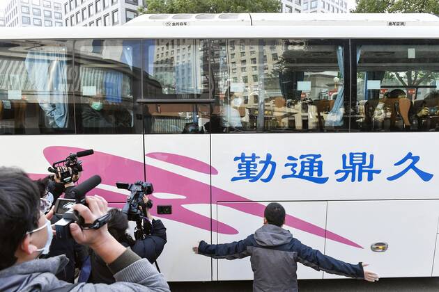 WHO probe into coronavirus origins in Wuhan Investigative team members of the World Health Organization leave their hotel by bus in Wuhan, China, on Jan. 28, 2021, after quarantining for two weeks. They started a full-fledged probe the same day in the city, where the novel coronavirus was first detected in late 2019. 