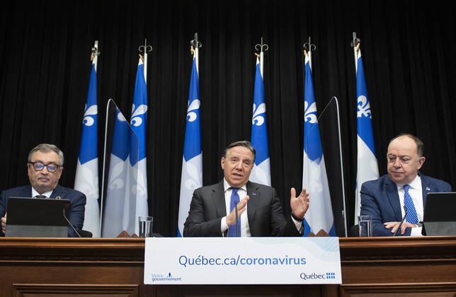 January 28, 2021, Quebec, PQ, Canada: Quebec Premier Francois Legault, centre, speaks during a news conference on the COVID-19 pandemic, Thursday, January 28, 2021 at the legislature in Quebec City. Legault is flanked by Horacio Arruda, Quebec director of National Public Health, left, and Quebec Health Minister Christian Dube. Quebec Canada - ZUMAc35_ 20210128_zaf_c35_032 Copyright: xJacquesxBoissinotx