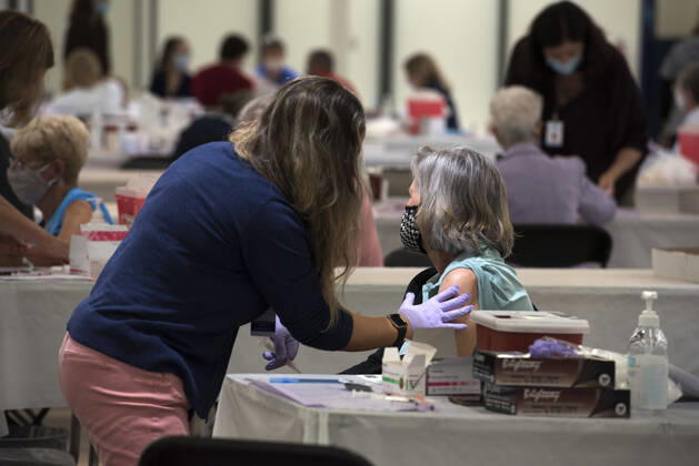 January 28, 2021, Sarasota, FL, USA: Florida residents 65 years and older get Covid-19 Vaccine shots at a vacant area of a Sarasota shopping center. The vaccine site hopes to serve at least 1,500 residents daily. Sarasota USA - ZUMAn03_ 20210128_zaf_n03_039 Copyright: xRobinxRaynex