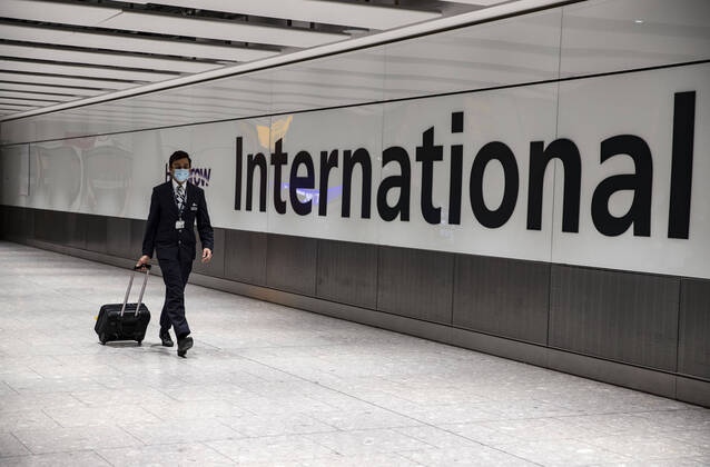 January 30, 2021, London, United Kingdom: A pilot from British Airways arrived at the Heathrow international arrival hall on January 29,2021. Around 200 people on the same direct flight from Hong Kong arrived to Heathrow international airport. Said one of the passenger..China has announced it will no longer recognise the passports of British national overseas citizens from January 31,2021, just hours after the UK launched its scheme to give passport holders a path to residency as political freedoms decline in Hong Kong. 300,000 people are expected use the new visa route to leave Hong Kong for Britain. London United Kingdom - ZUMAj323 20210130_zip_j323_006 Copyright: xMayxJamesx