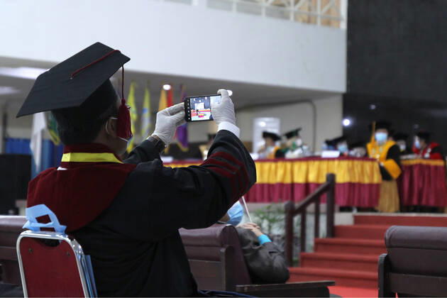 Indonesia: Student Graduation during the Covid-19 pandemic Students Graduation During the pandemic at the State Islamic University of Palembang, South Sumatra, Saturday, January 30, 2021 Palembang South Sumatra Indonesia Copyright: AdamxRachman