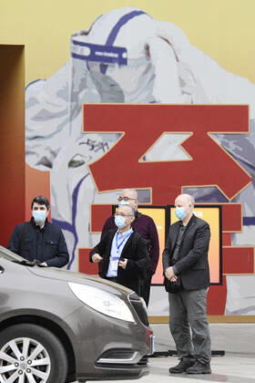 WHO probe into coronavirus origins in Wuhan Members of the World Health Organization s team investigating the origins of the coronavirus pandemic are pictured after visiting an exhibition about China s fight against the virus on Jan. 30, 2021, in Wuhan. 