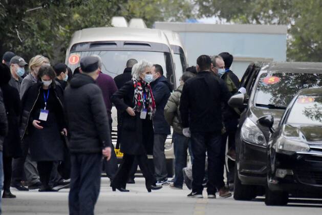 WHO probe into coronavirus origins in Wuhan Members of the World Health Organization s team investigating the origins of the coronavirus pandemic are pictured after visiting Wuhan Jinyintan Hospital in Wuhan, China, on Jan. 30, 2021. 
