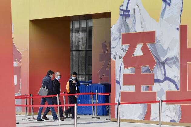 WHO probe into coronavirus origins in Wuhan Members of the World Health Organization s team investigating the origins of the coronavirus pandemic visit an exhibition about China s fight against the virus on Jan. 30, 2021, in Wuhan. 
