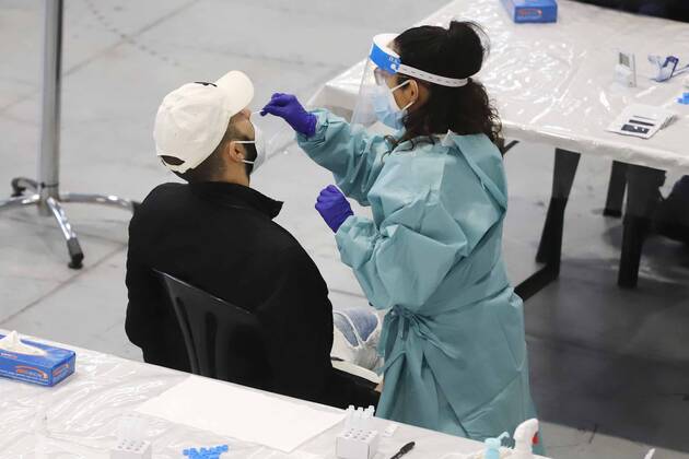 A man undergoes an antigen test in a mass screening device at the Instituto Ferial de Vigo, in Vigo, Galicia (Spain), on January 30, 2021. As reported by the Xunta de Galicia, a total of 22,000 people have been invited to participate in this new mass population screening with antigen test at the Instituto Ferial de Vigo. This device began this Friday afternoon and will remain until next Wednesday. 30 JANUARY 2021;VIGO;MASS SCREENING;SCREENING;CORONAVIRUS;ANTIGENS;EPIDEMIC;PANDEMIC;GALICIA;PONTEVEDRA Marta Vazquez Rodriguez LagenciaEP 01 30 2021 VIGO, GALICIA VIGO, GALICIA Spain Copyright: xMartaxVazquezxRodriguezx 3540494
