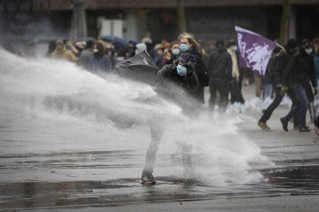 Protesters faced water jets during a demonstration against the La Manif pour Tous (Protest for All) and the patriots movements who opposed to the PMA (Assisted reproductive technology - ART), on January, 30, 2021, in Rennes, western France.  Copyright: xJeremiasxGonzalezx