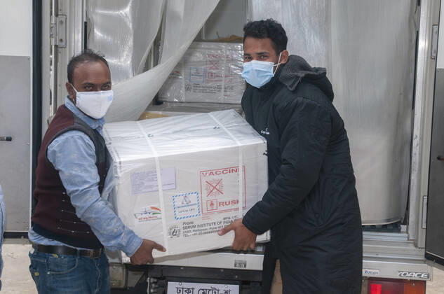 January 31, 2021: The widely circulated vaccine for the Arford-Astrageneca CVID-19 vaccine by the Serum Institute of India has reached Sylhet. The vaccine was brought to the Sylhet Civil Surgeon s Office in a fridge van of Beximco Pharmaceuticals at 12 noon. Vaccination is expected to start from February 8,2021. - ZUMAr143 20210131_zap_r143_021 Copyright: xMdxRafayatxHaquexKhanx