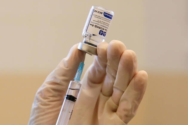 SOCHI, RUSSIA - FEBRUARY 1, 2021: A medical worker prepares a syringe during vaccination with the Gam-COVID-Vak (Sputnik V) vaccine against COVID-19 at Sochi s City Hospital No 4. Dmitry Feoktistov TASS  TS0F5AB0