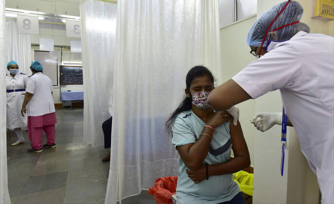 MUMBAI, INDIA - FEBRUARY 1: A beneficiary gets vaccinated against Covid-19 at Nair Hospital, on February 1, 2021 in Mumbai, India. (Photo by Anshuman Poyrekar Hindustan Times) India s Covid-19 Vaccination Drive