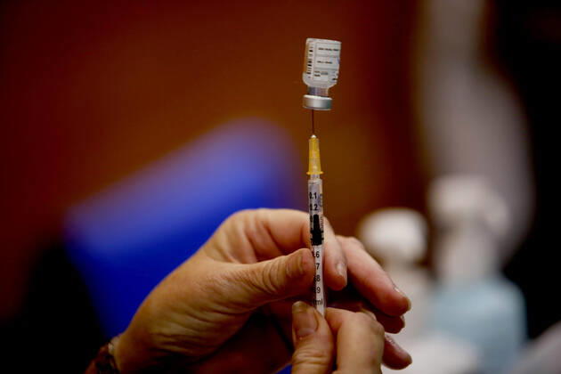 (210201) -- TEL AVIV, Feb. 1, 2021 -- A medical worker prepares the COVID-19 vaccine at a health service center in Tel Aviv, Israel, on Feb. 1, 2021. Israel s Ministry of Health reported 8,399 new COVID-19 cases on Monday, bringing the tally in the country to 651,405. The number of people vaccinated against the COVID-19 in Israel has surpassed 3.14 million, or 33.8 percent of its total population, since the vaccination campaign began on Dec. 20, 2020. (Photo by Xinhua) ISRAEL-TEL AVIV-COVID-19-VACCINATION GilxCohenxMagen