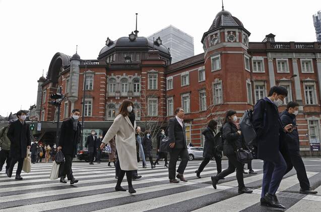 Japan to extend virus emergency to March 7 as hospitals strained Commuters wearing face masks head to work near JR Tokyo Station on Feb. 2, 2021. The Japanese government is set to extend a coronavirus state of emergency for Tokyo and other regions by one month to March 7 in view of manpower-strapped hospitals amid a surge in serious patients. 