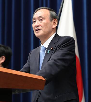 Japan extends virus emergency for Tokyo and other regions Japanese Prime Minister Yoshihide Suga holds a press conference in Tokyo on Feb. 2, 2021, after he declared an extension of the coronavirus state of emergency for Tokyo, Osaka and other regions by one month to March 7 in view of manpower-strapped hospitals. (Pool photo) 