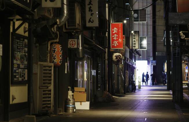 Japan extends virus emergency for Tokyo and other regions Fukuoka s Nakasu entertainment area is seen deserted on Feb. 2, 2021. Japan extended the coronavirus state of emergency for Tokyo, Fukuoka and other regions the same day by one month to March 7 in view of manpower-strapped hospitals. 