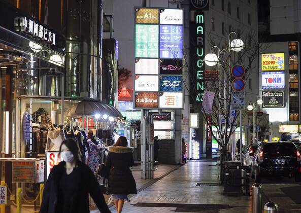Japan extends virus emergency for Tokyo and other regions Fewer people than usual are seen in Fukuoka s Nakasu area on Feb. 2, 2021. Japan extended the coronavirus state of emergency for Tokyo, Fukuoka and other regions the same day by one month to March 7 in view of manpower-strapped hospitals. 