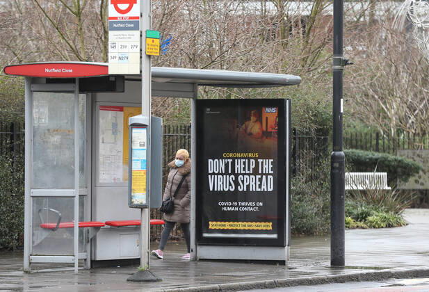 February 2, 2021, London, England, United Kingdom: A Ã¢â‚¬oeDonÃ¢â‚¬â ¢t help the virus spreadÃ¢â‚¬Â sign at a bust stop In Tottenham. The north London neighbourhood is among the seven areas in the country the UK government started Ã¢â‚¬oesurge testingÃ¢â‚¬Â to find and isolate covid-19 cases caused by South African variant of the coronavirus. London United Kingdom - ZUMAs262 20210202_zip_s262_018 Copyright: xTayfunxSalcix