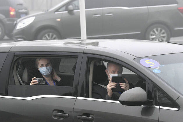 WHO probe into coronavirus origins in Wuhan Members of the World Health Organization s team investigating the origins of the coronavirus pandemic arrive at the Wuhan Institute of Virology in Wuhan, China, on Feb. 3, 2021. 