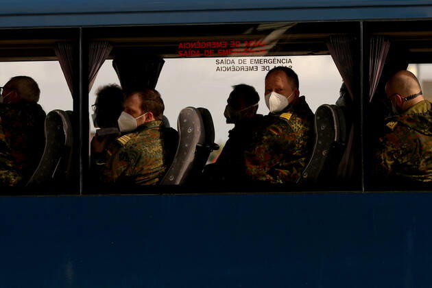 (210203) -- LISBON, Feb. 3, 2021 -- German army medical experts are seen in a bus at Figo Maduro military airbase in Lisbon, Portugal, on Feb. 3, 2021. Based on a bilateral agreement, a team of German army medical experts arrived in Portugal on Wednesday to assist the country in its fight against the COVID-19 pandemic. (Photo by Xinhua) PORTUGAL-LISBON-COVID-19-GERMANY-ARMY MEDICS-ARRIVING PedroxFiuza