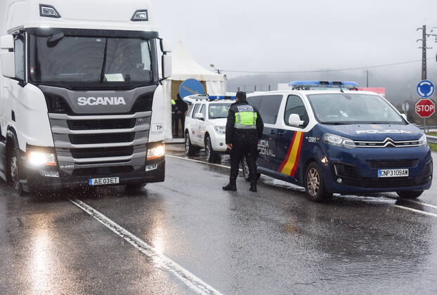 February 4, 2021, Monfortinho, Portugal: Border police officer inspects a vehicle at a checkpoint amid coronavirus crisis..Since January 31, Portugal closed its land border with Spain, for a period of at least two weeks in an attempt to contain the virus. Just essential movements are still allowed, such for workers, medical reasons and goods™ transportation. Monfortinho Portugal - ZUMAs197 20210204_zaa_s197_184 Copyright: xGustavoxValientex