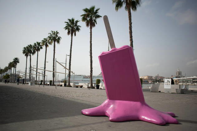 February 5, 2021, Malaga, Spain: An installation with a figure of a melted ice cream is pictured on an empty street at a commercial area in Malaga..Many stores, shops and non-essential activities that closed due to the third wave of coronavirus pandemic show again empty situations in various places of Malaga city, at least until 15 February. Malaga Spain - ZUMAs197 20210205_zaa_s197_043 Copyright: xJesusxMeridax