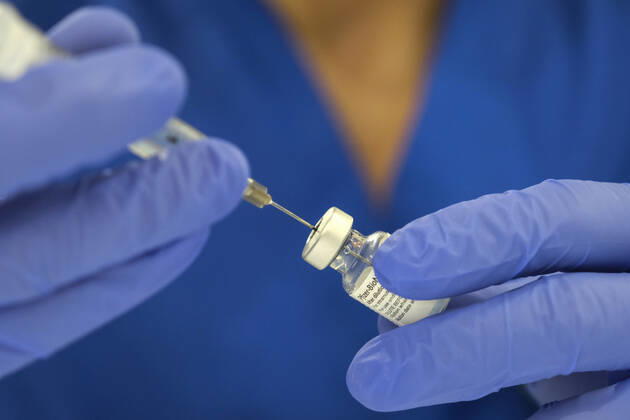 February 5, 2021, Los Angeles, California, USA: A healthcare worker prepares doses of COVID-19 vaccine at a mass COVID-19 vaccination site at Cal Poly Pomona, Friday Feb. 5, 2021 in Pomona, California. Los Angeles USA - ZUMAc68_ 20210205_zaf_c68_010 Copyright: xRingoxChiux
