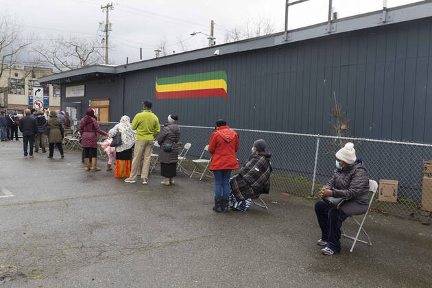 February 5, 2021, Seattle, Washington, USA: Patients line up at a pop up vaccination clinic at the Ethiopian Community of Seattle in the Rainier Valley on Friday, February 5, 2021. To date, the Seattle Fire Department Mobile Vaccination Teams have vaccinated 2,436 vulnerable Seattle residents and workers since launching its vaccination effort on January 14, 2021. Seattle USA - ZUMAg235 20210205_zap_g235_013 Copyright: xPaulxChristianxGordonx