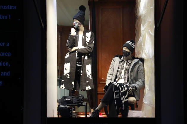 (210206) -- LJUBLJANA, Feb. 6, 2021 -- Mannequins wearing face masks are seen in a store window in Ljubljana, Slovenia, Feb. 5, 2021. More services will be available to Slovenians as the government announced on Friday relaxation of restrictive measures imposed to contain the coronavirus. Slovenia on Friday registered 959 new COVID-19 cases, taking the national tally of confirmed cases to 172,209, according to the National Institute of Public Health. ) SLOVENIA-COVID-19-CASES PengxLijun 