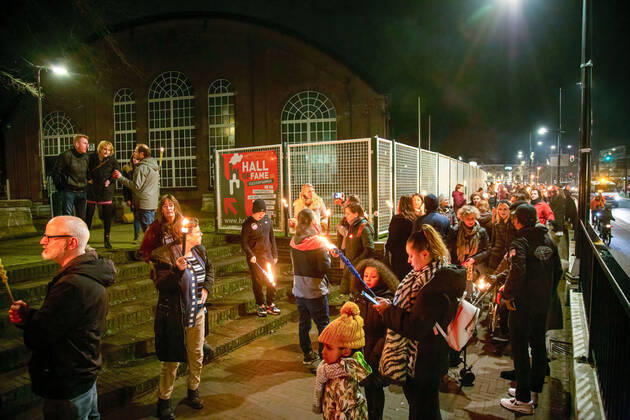 February 5, 2021, Tilburg, North Brabant, Netherlands: Protesters converging with torches during the demonstration..A torch-lit protest was held against the new measures that the government imposed in January to fight the spread of the Coronavirus Covid-19 pandemic. The Anti-Curfew and Anti-lockdown demonstration were peaceful. A strict curfew is applied in the Netherlands between 21:00-04:30. Violent protests against the Covid 19 measures took place in January. Tilburg Netherlands - ZUMAs197 20210205_zaa_s197_257 Copyright: xNikxOikox