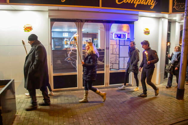 February 5, 2021, Tilburg, North Brabant, Netherlands: Protesters marching with torches during the demonstration..A torch-lit protest was held against the new measures that the government imposed in January to fight the spread of the Coronavirus Covid-19 pandemic. The Anti-Curfew and Anti-lockdown demonstration were peaceful. A strict curfew is applied in the Netherlands between 21:00-04:30. Violent protests against the Covid 19 measures took place in January. Tilburg Netherlands - ZUMAs197 20210205_zaa_s197_263 Copyright: xNikxOikox