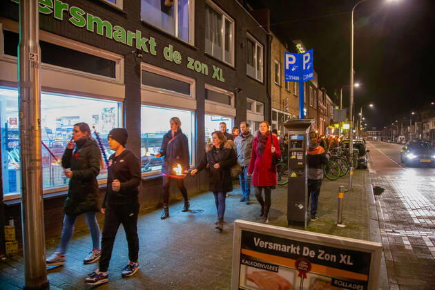 February 5, 2021, Tilburg, North Brabant, Netherlands: Protesters marching with torches during the demonstration..A torch-lit protest was held against the new measures that the government imposed in January to fight the spread of the Coronavirus Covid-19 pandemic. The Anti-Curfew and Anti-lockdown demonstration were peaceful. A strict curfew is applied in the Netherlands between 21:00-04:30. Violent protests against the Covid 19 measures took place in January. Tilburg Netherlands - ZUMAs197 20210205_zaa_s197_266 Copyright: xNikxOikox